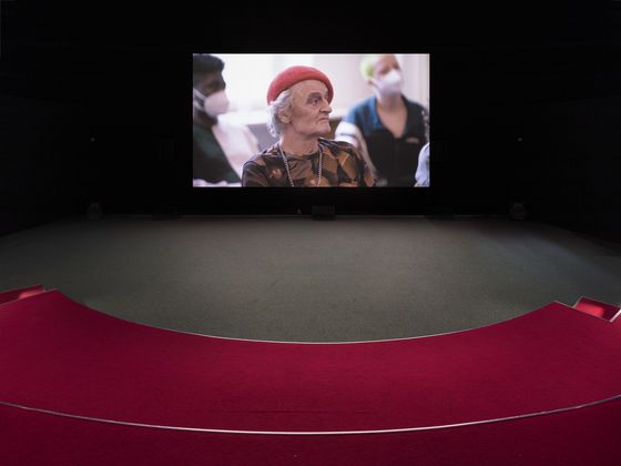 View of the video room with projection of the work onto a screen